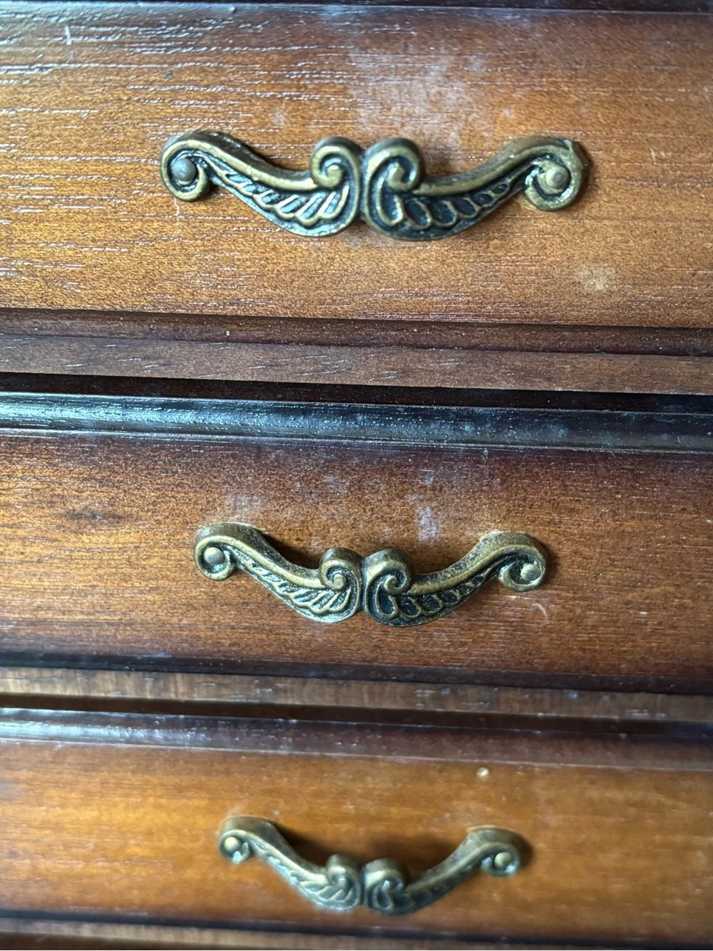 Antique wood jewelry box with drawers and metal hardware